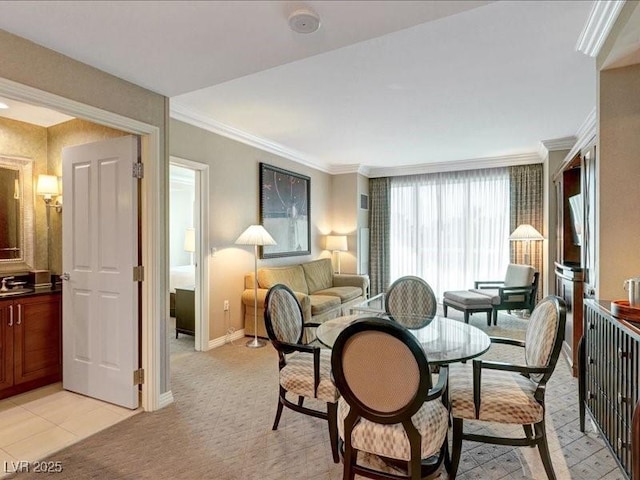 125 E Harmon Ave Unit 220, Las Vegas, NV 89109 - dining area with crown molding and light carpet