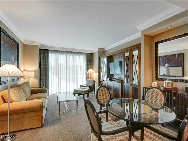 125 E Harmon Ave Unit 220, Las Vegas, NV 89109 - living area featuring ornamental molding and light colored carpet