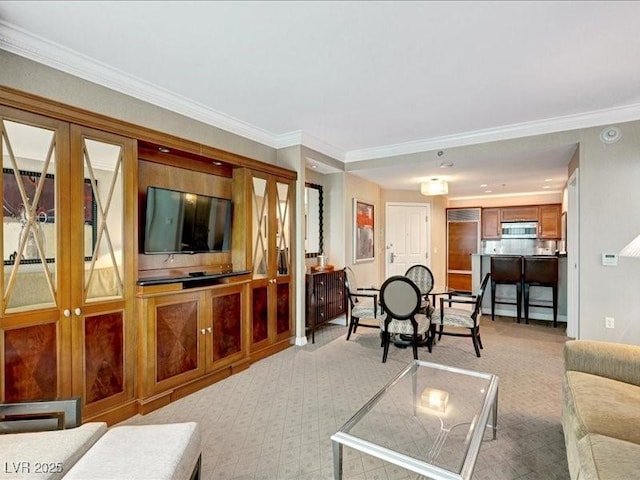 125 E Harmon Ave Unit 220, Las Vegas, NV 89109 - living area with carpet floors and crown molding