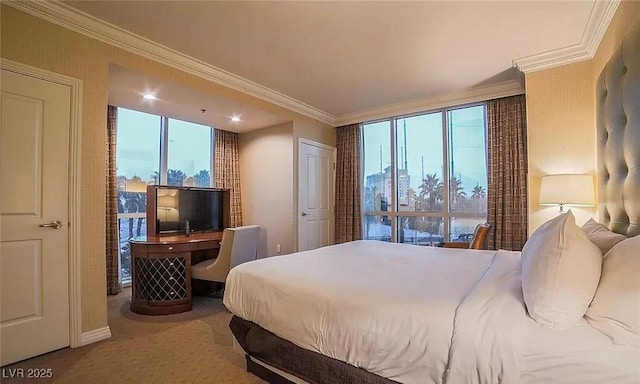 125 E Harmon Ave Unit 220, Las Vegas, NV 89109 - carpeted bedroom with ornamental molding and baseboards