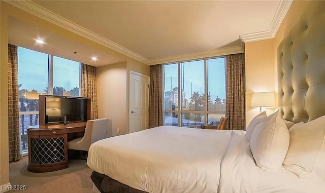 125 E Harmon Ave Unit 220, Las Vegas, NV 89109 - bedroom with crown molding and carpet flooring