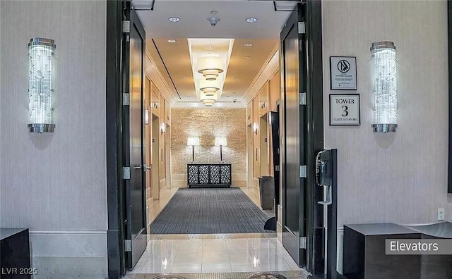 125 E Harmon Ave Unit 220, Las Vegas, NV 89109 - hallway featuring a raised ceiling