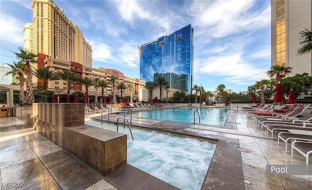 125 E Harmon Ave Unit 220, Las Vegas, NV 89109 - community pool featuring a patio