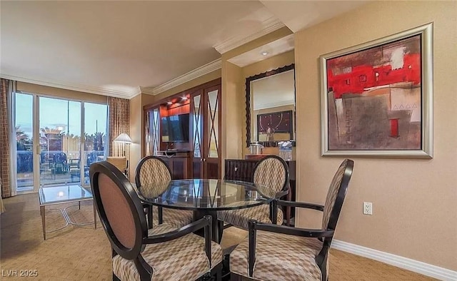 125 E Harmon Ave Unit 220, Las Vegas, NV 89109 - dining area with baseboards and crown molding