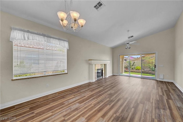 3520 Round Valley Way, Las Vegas, NV 89129 - unfurnished living room featuring a fireplace, a chandelier, wood finished floors, a ceiling fan, and high vaulted ceiling