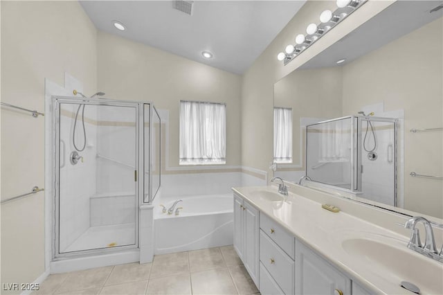 3520 Round Valley Way, Las Vegas, NV 89129 - bathroom featuring tile patterned flooring, a garden tub, a stall shower, double vanity, and lofted ceiling