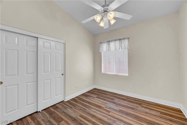 3520 Round Valley Way, Las Vegas, NV 89129 - unfurnished bedroom with dark wood-style floors, lofted ceiling, a closet, and a ceiling fan