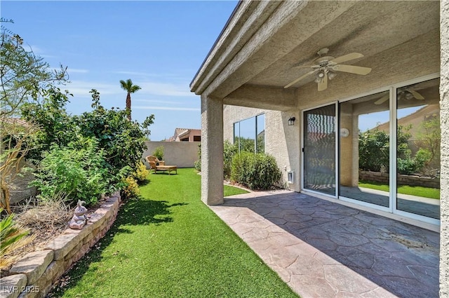 3520 Round Valley Way, Las Vegas, NV 89129 - fenced backyard featuring a ceiling fan and a patio area