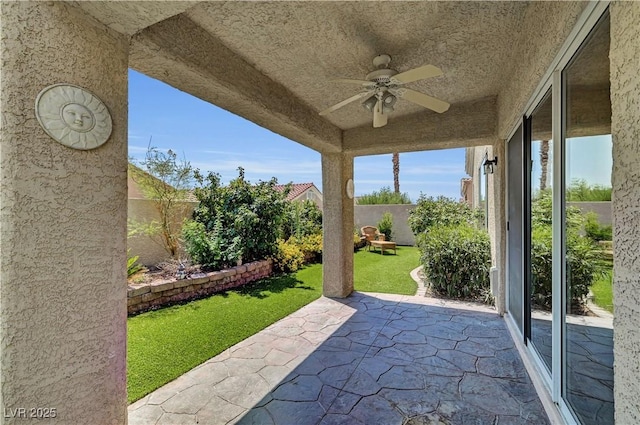 3520 Round Valley Way, Las Vegas, NV 89129 - fenced backyard featuring ceiling fan and a patio area