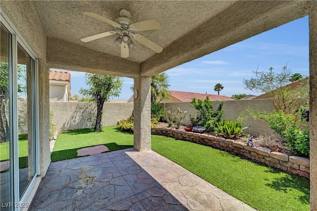3520 Round Valley Way, Las Vegas, NV 89129 - fenced backyard featuring ceiling fan and a patio