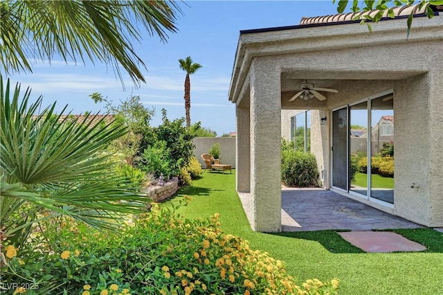 3520 Round Valley Way, Las Vegas, NV 89129 - view of yard with a ceiling fan and a patio