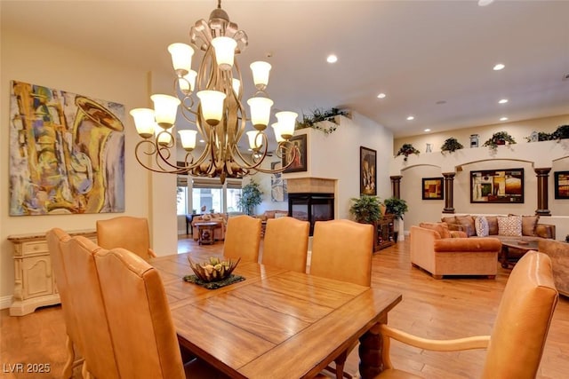 8465 Picket Ridge Ct, Las Vegas, NV 89143 - dining space with a chandelier, light wood-style floors, and recessed lighting