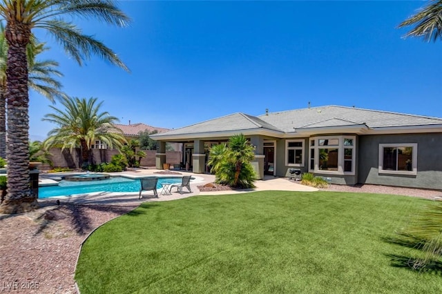 8465 Picket Ridge Ct, Las Vegas, NV 89143 - rear view of property with a patio, a pool with connected hot tub, and stucco siding