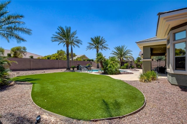 8465 Picket Ridge Ct, Las Vegas, NV 89143 - fenced backyard with a patio
