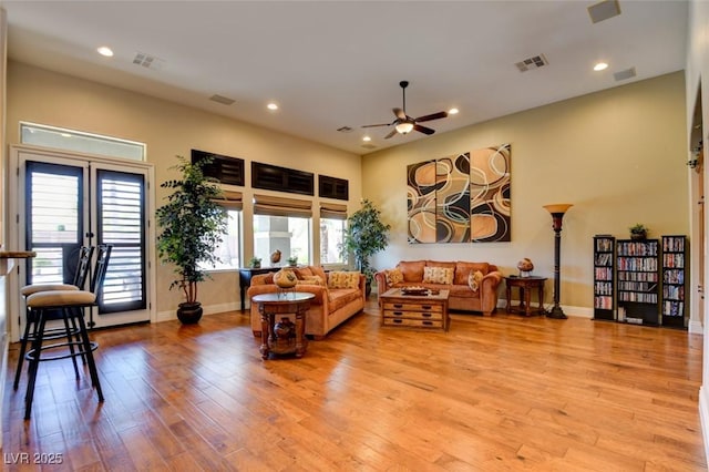 8465 Picket Ridge Ct, Las Vegas, NV 89143 - living room with recessed lighting, ceiling fan, and light wood finished floors