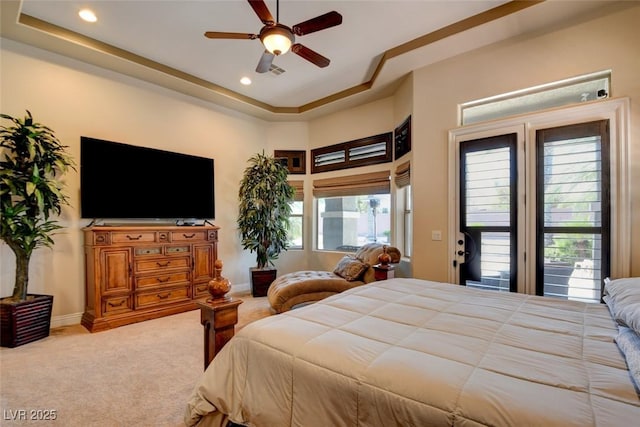 8465 Picket Ridge Ct, Las Vegas, NV 89143 - bedroom with carpet floors, a tray ceiling, recessed lighting, a ceiling fan, and access to outside