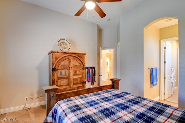 8465 Picket Ridge Ct, Las Vegas, NV 89143 - bedroom featuring arched walkways, carpet, and a ceiling fan