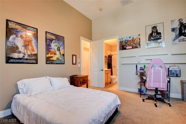 8465 Picket Ridge Ct, Las Vegas, NV 89143 - bedroom featuring carpet and connected bathroom