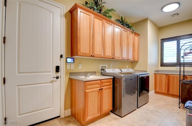 8465 Picket Ridge Ct, Las Vegas, NV 89143 - laundry room with cabinet space, independent washer and dryer, and light tile patterned floors