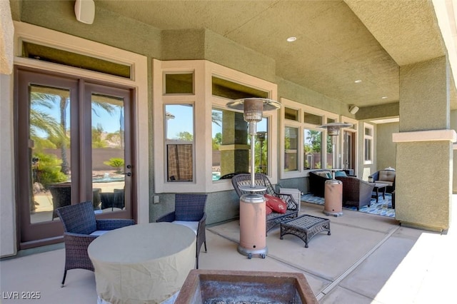 8465 Picket Ridge Ct, Las Vegas, NV 89143 - view of patio featuring an outdoor hangout area