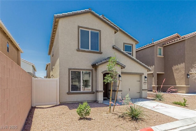 6443 Burlap Ct, Las Vegas, NV 89122 - mediterranean / spanish home with driveway, stucco siding, and an attached garage