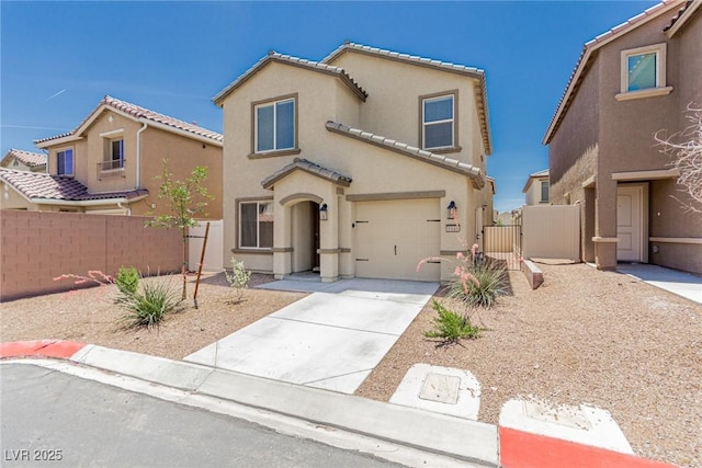 6443 Burlap Ct, Las Vegas, NV 89122 - mediterranean / spanish-style home with stucco siding, a gate, driveway, a garage, and a tiled roof