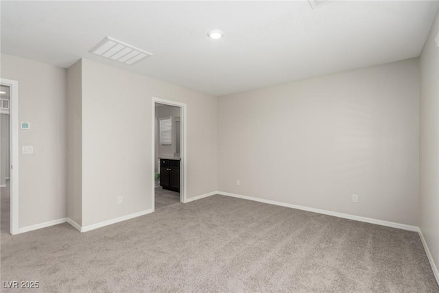 6443 Burlap Ct, Las Vegas, NV 89122 - empty room with light carpet and recessed lighting