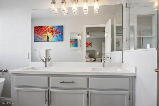 2228 Brighton Shore St, Las Vegas, NV 89128 - full bath with connected bathroom, double vanity, a ceiling fan, and a shower with door
