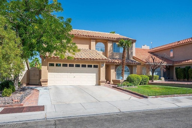 2228 Brighton Shore St, Las Vegas, NV 89128 - mediterranean / spanish-style home featuring stucco siding, concrete driveway, a gate, a tile roof, and a front lawn