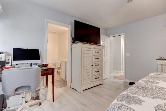 441 Groft Way, Henderson, NV 89015 - bedroom with light wood-style floors, an office area, and ensuite bath