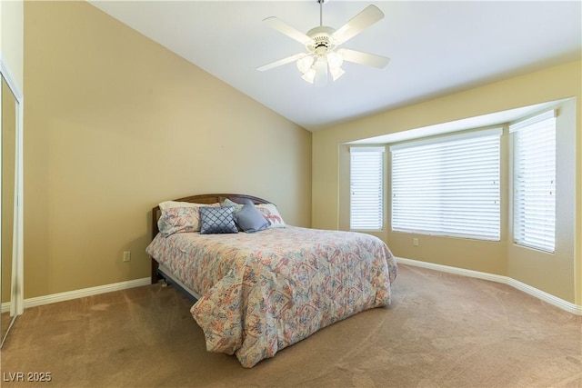 3016 Lotus Hill Dr, Las Vegas, NV 89134 - carpeted bedroom with vaulted ceiling and a ceiling fan