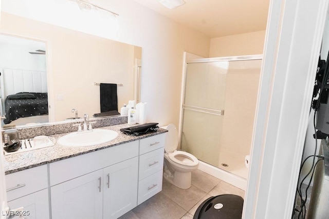 7331 Sunray Point St, North Las Vegas, NV 89084 - ensuite bathroom featuring a shower stall, vanity, and tile patterned flooring