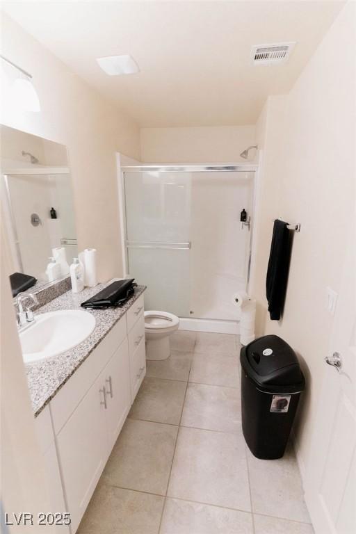 7331 Sunray Point St, North Las Vegas, NV 89084 - full bath with vanity, a shower stall, and tile patterned flooring