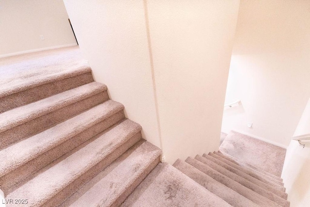 7331 Sunray Point St, North Las Vegas, NV 89084 - stairway featuring carpet flooring