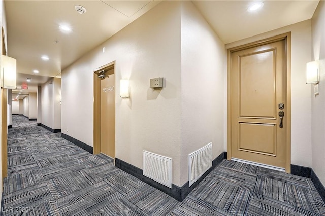 87 E Agate Ave Unit 208, Las Vegas, NV 89123 - corridor with dark colored carpet and recessed lighting