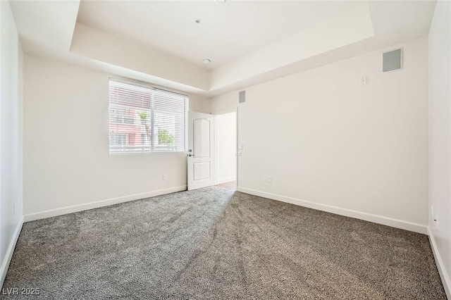87 E Agate Ave Unit 208, Las Vegas, NV 89123 - carpeted spare room with a tray ceiling and baseboards