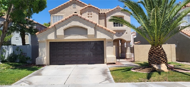 9204 Vosburgh Dr, Las Vegas, NV 89117 - mediterranean / spanish-style house featuring driveway, stucco siding, and a tiled roof