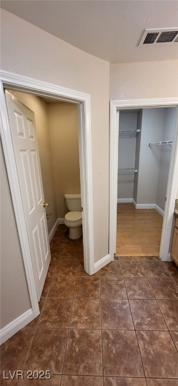 9204 Vosburgh Dr, Las Vegas, NV 89117 - bathroom with tile patterned floors and a spacious closet