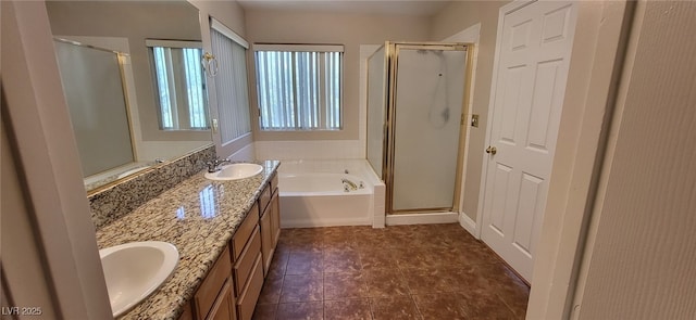 9204 Vosburgh Dr, Las Vegas, NV 89117 - full bathroom featuring a shower stall, a garden tub, double vanity, and tile patterned flooring