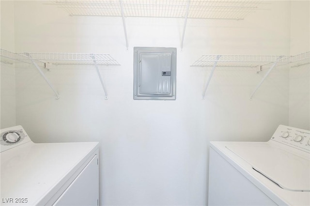 7159 S Durango Dr Unit 310, Las Vegas, NV 89113 - washroom featuring washing machine and dryer and electric panel