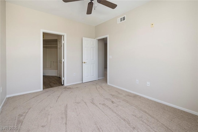 7159 S Durango Dr Unit 310, Las Vegas, NV 89113 - unfurnished bedroom with carpet floors and ceiling fan