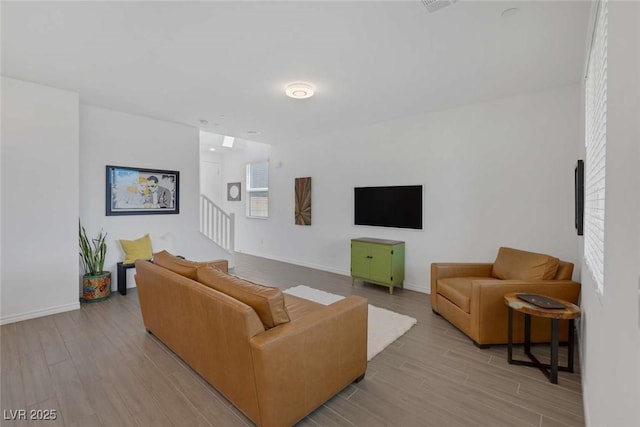 9827 Mojave Mountain St, Las Vegas, NV 89166 - living area with light wood finished floors and stairway