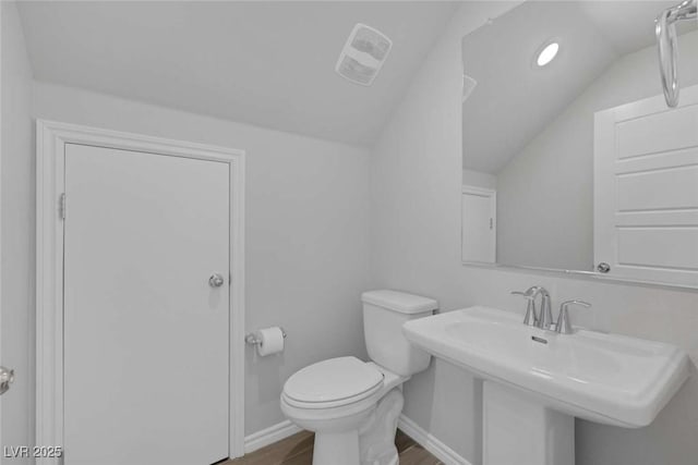 9827 Mojave Mountain St, Las Vegas, NV 89166 - bathroom featuring vaulted ceiling and wood finished floors