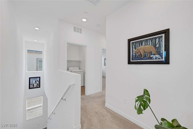 9827 Mojave Mountain St, Las Vegas, NV 89166 - corridor featuring an upstairs landing, washing machine and dryer, light carpet, and recessed lighting