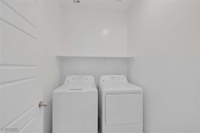 9827 Mojave Mountain St, Las Vegas, NV 89166 - washroom with washer and dryer