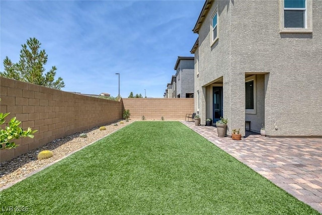 9827 Mojave Mountain St, Las Vegas, NV 89166 - fenced backyard featuring a patio area