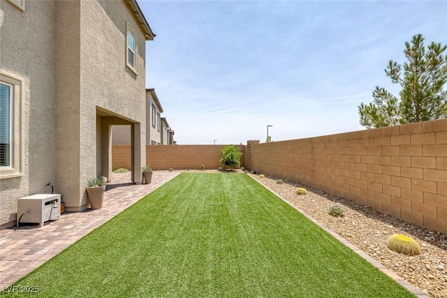 9827 Mojave Mountain St, Las Vegas, NV 89166 - fenced backyard featuring a patio area