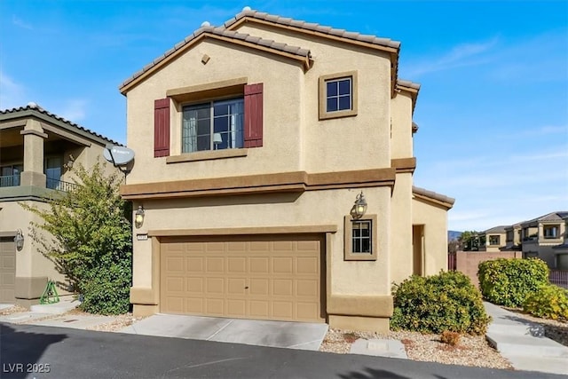 9916 Fallowdeer Ct, Las Vegas, NV 89149 - mediterranean / spanish-style house with an attached garage, stucco siding, a tile roof, and driveway