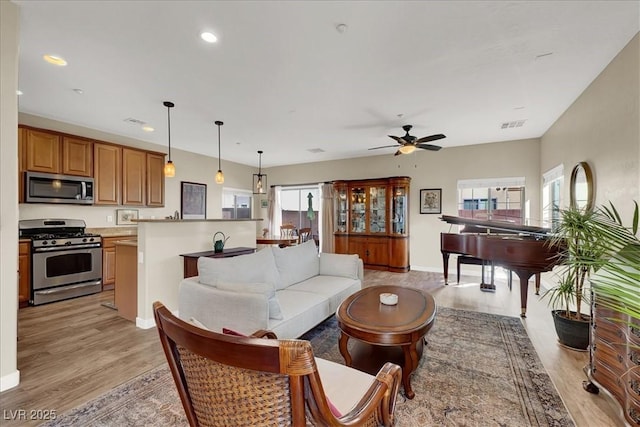 9916 Fallowdeer Ct, Las Vegas, NV 89149 - living area with light wood-style flooring, plenty of natural light, recessed lighting, and ceiling fan