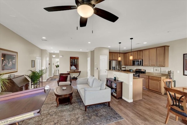 9916 Fallowdeer Ct, Las Vegas, NV 89149 - living area with recessed lighting, light wood finished floors, and a ceiling fan